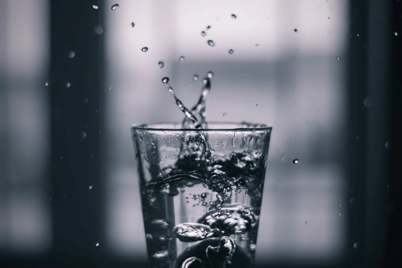 A splash of water in a clear glass